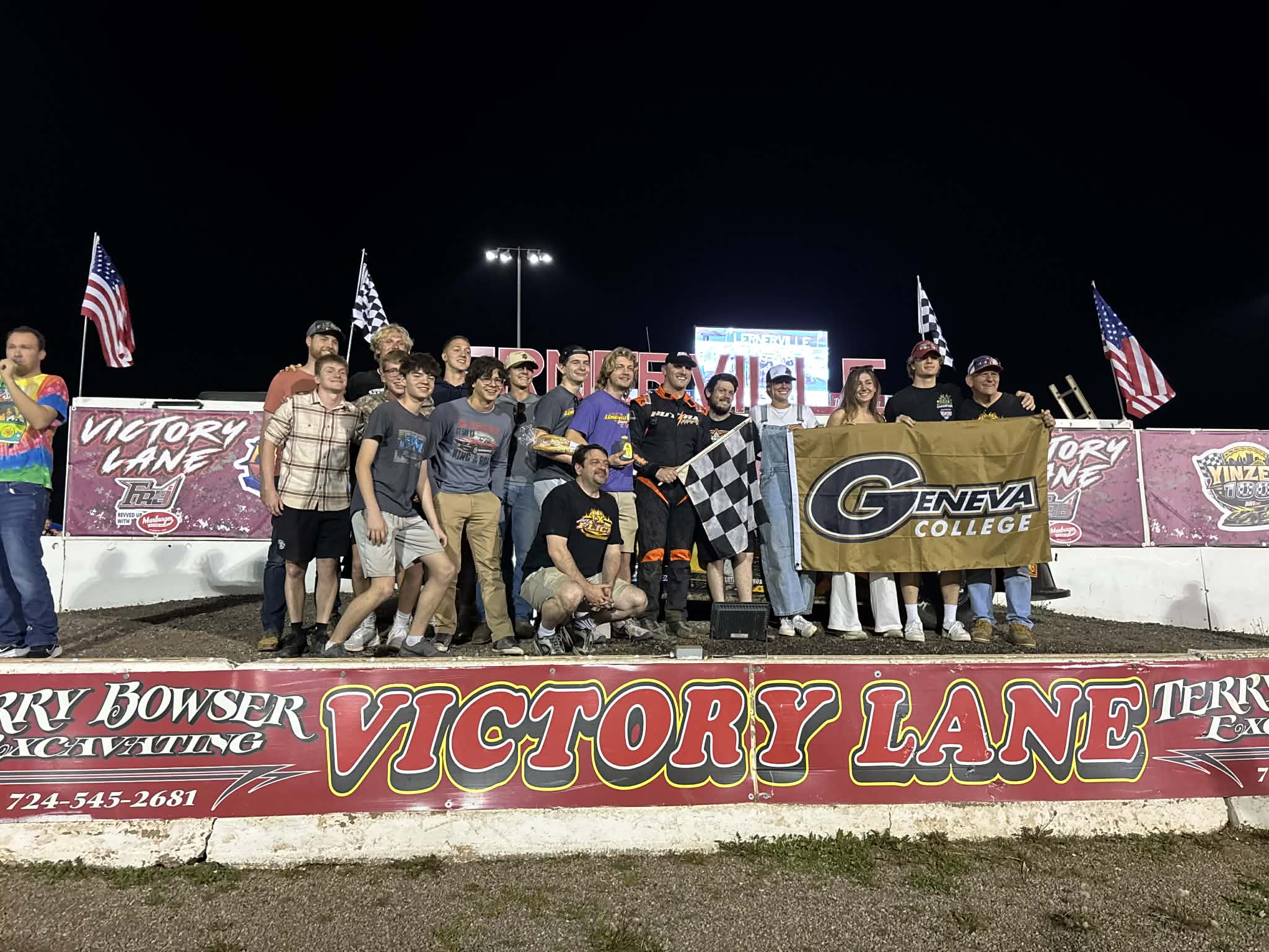 Several Alumni members pose for a photograph at Lernerville Speedway