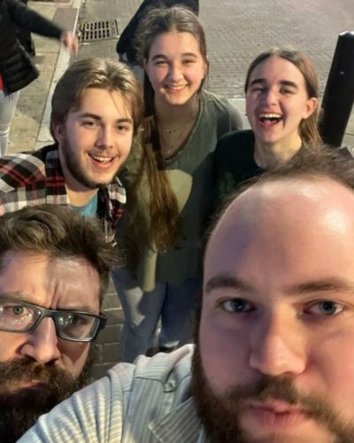 photo of group leaders with 3 students