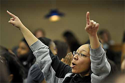 Times photo by CHRISTINA BAIRD  Geneva College student Tiara Lucas, a junior, celebrates after the 44th president of the United States, Barack Obama, takes the oath of office Tuesday. 