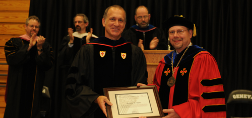 Dr. Don Opitz receives the Excellence in Scholarship award.