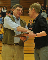 Dr. Kim Gall presents an Honorary G to Dr. David Badger