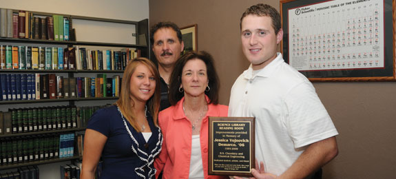 Jessica (Vojnovich '06) DeMarco's family from feft to right: Jessica′s sister, Jamie; her parents, Sam and Terri; and her husband, Dan.