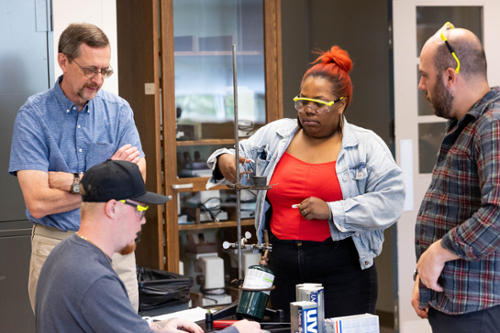 Kerry McMahon working with students during a lab