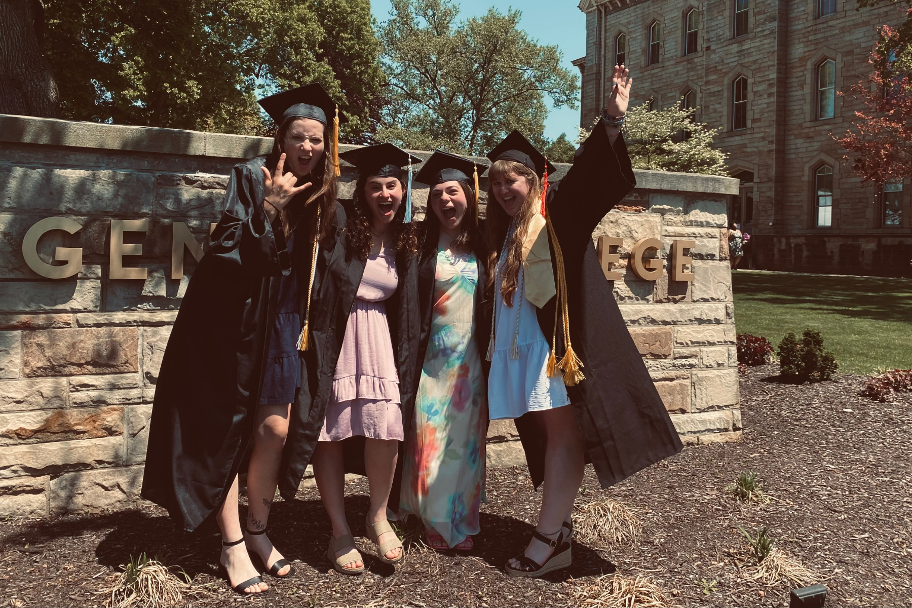 Cammie Crouse '25 (far left) celebrates her Geneva graduation with her friends.