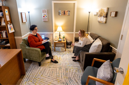 Licensed Counselor counseling with an indivdual within the Geneva community